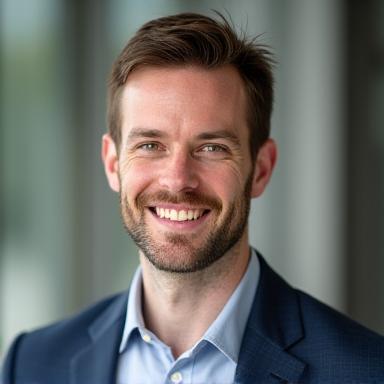 Professional headshot of Ben Carter